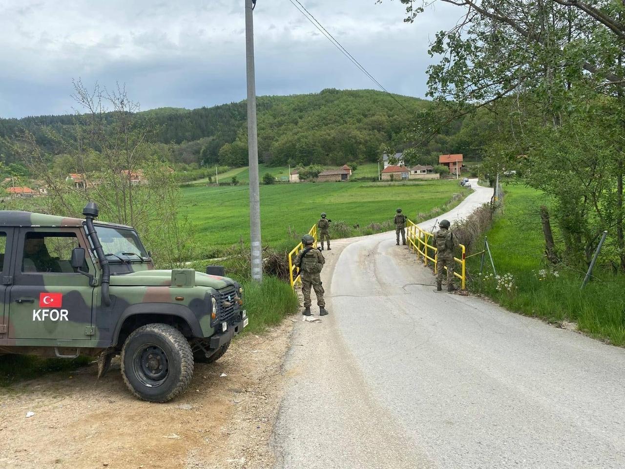 KFOR personnel stationed on a rural road in Kosovo conduct security patrols in the countryside, with Turkish troops monitoring a checkpoint near a small village in Kosovo, on May 16, 2025. (AA Photo)