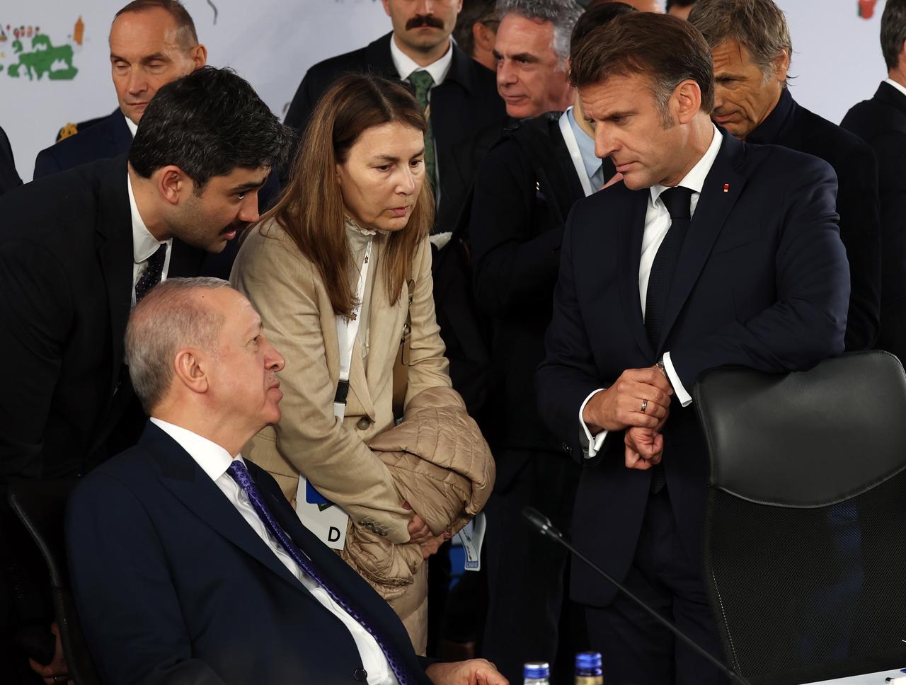TIRANA, ALBANIA - MAY 16: (----EDITORIAL USE ONLY - MANDATORY CREDIT - TURKISH PRESIDENCY / MURAT CETINMUHURDAR / HANDOUT - NO MARKETING NO ADVERTISING CAMPAIGNS - DISTRIBUTED AS A SERVICE TO CLIENTS----) Turkish President Recep Tayyip Erdogan chats with French President Emmanuel Macron during the 6th Summit of the European Political Community in Tirana, Albania on May 16, 2025. ( TUR Presidency /Murat Cetinmuhurdar - Anadolu Agency )