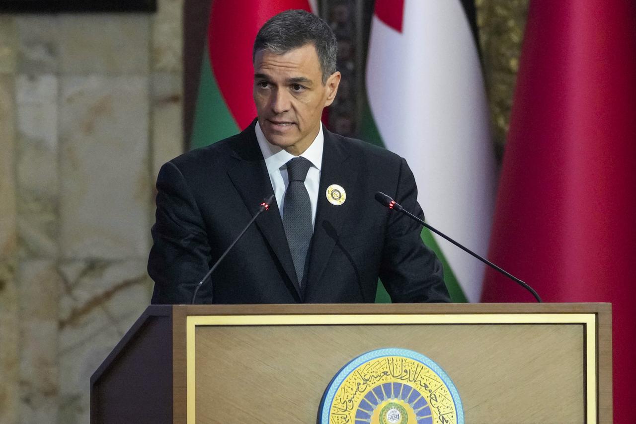 Spanish Prime Minister Pedro Sanchez addresses the 34th Arab League summit in Baghdad on May 17, 2025. (Photo by Hadi Mizban / POOL / AFP)