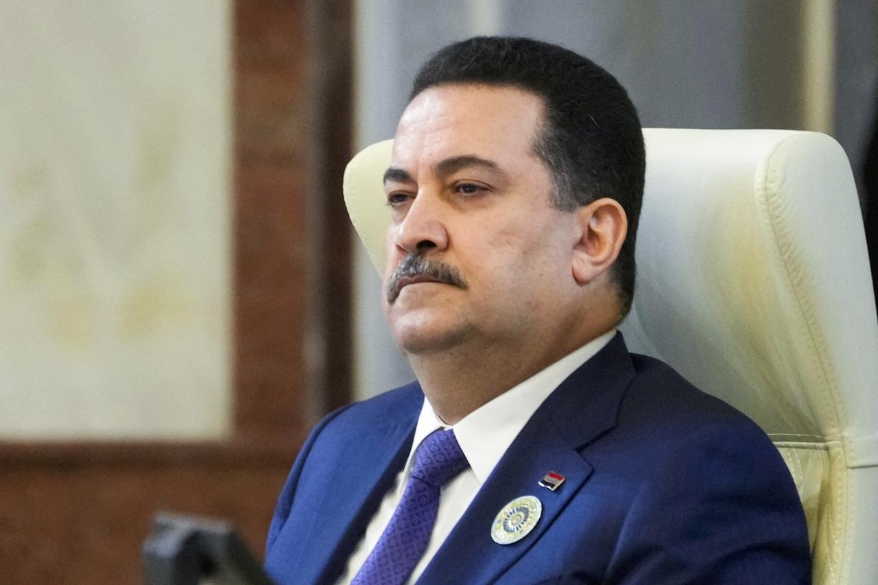 Iraqs Prime Minister Mohammed Shia al-Sudani attends the 34th Arab League summit in Baghdad on May 17, 2025. (Photo by Hadi Mizban / POOL / AFP)