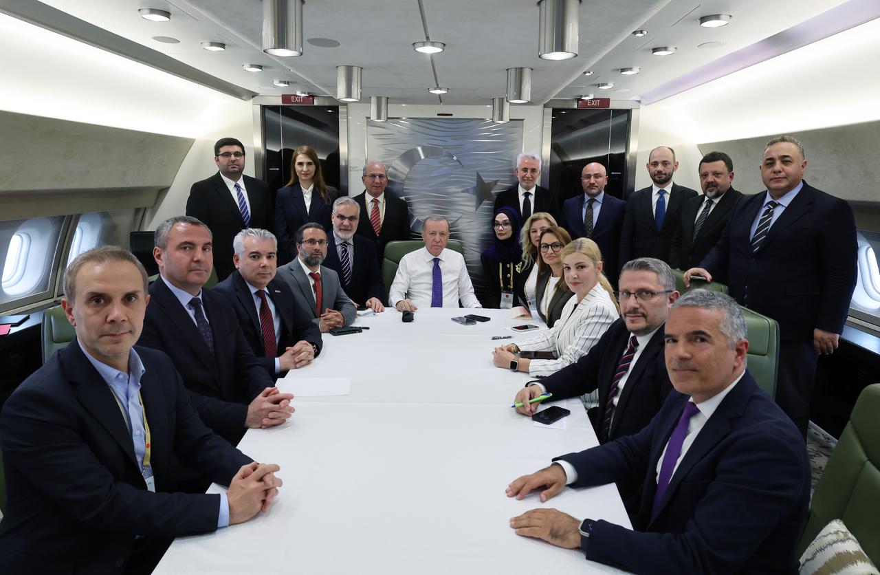 President Recep Tayyip Erdogan with journalists on the plane after attending to to 6th European Political Community summit held in Tirana, Albania on May 17, 2025. (Photo Handout / Presidency of the Republic of Türkiye) 