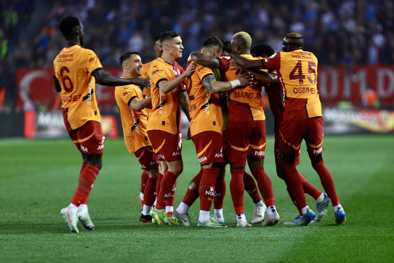 Players of Galatasaray celebrate after scoring a goal during the Turkish Super Lig week 35 football match between Trabzonspor and Galatasaray at Papara Park in Trabzon, Turkiye on May 10, 2025. (AA Photo)