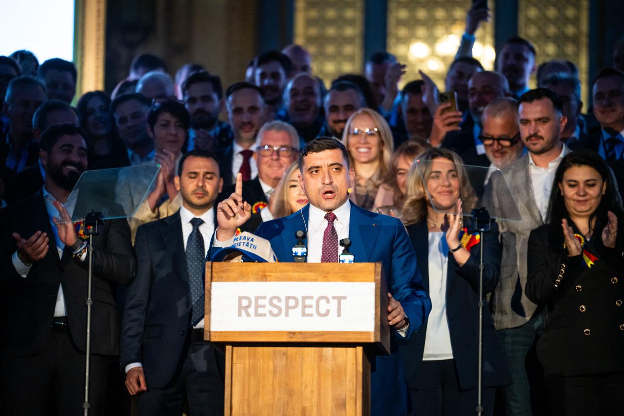 Leader of nationalist sovereign party 'Alliance for the Union of Romanians' AUR George Simion speaks to supporters after first exit polls were announced, in the second round of the Presidential election in Bucharest, Romania, on May 18, 2025. (AFP Photo)