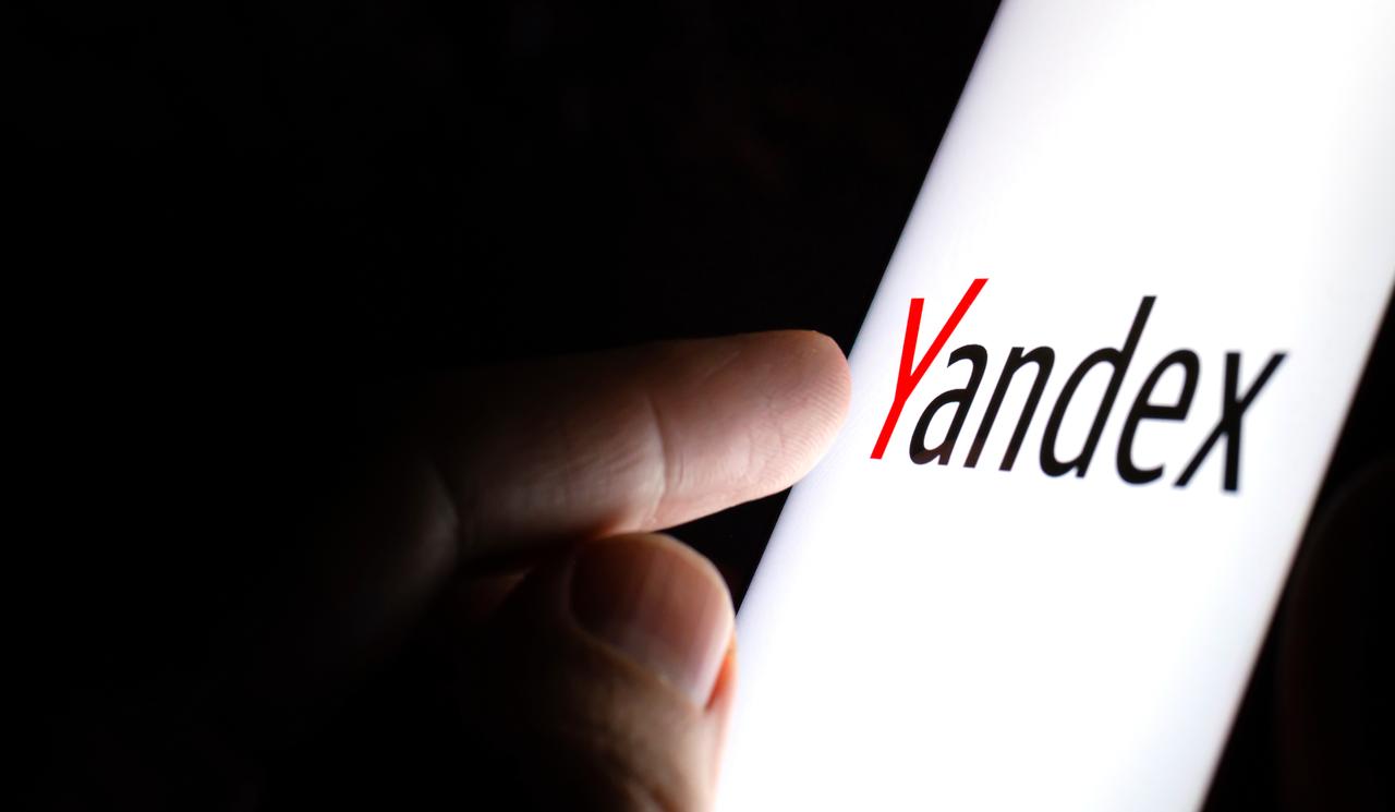 Photo illustration shows a user interacting with the Yandex mobile application, accessed on May 18, 2025. (Adobe Stock Photo)