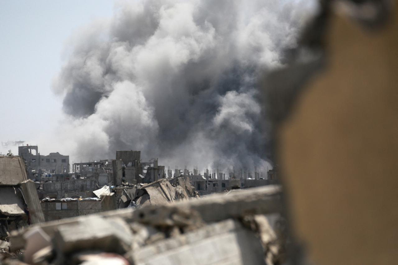 Smoke rises from the site of an Israeli strike in eastern Jabalia in the northern Gaza Strip on May 19, 2025. Prime Minister Benjamin Netanyahu said on May 19 that Israel will  take control  of the whole of Gaza, as the military pressed a newly intensified campaign in the war-ravaged territory. (Photo by Bashar TALEB / AFP)