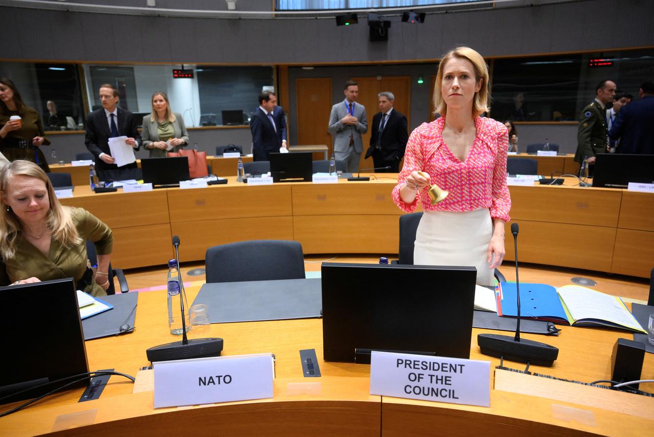 European Union for Foreign Affairs and Security Policy Kaja Kallas rings the bell as she waits for Nato Secretary General Mark Rutte before a Defence Council meeting at the EU headquarters in Brussels on May 20, 2024. (Photo by JOHN THYS / AFP)
