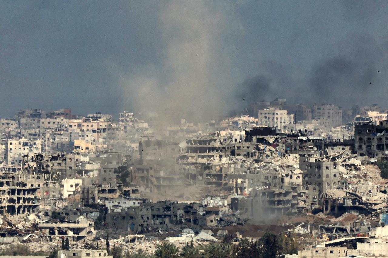 This picture taken from a position in southern Israel on the border with the Gaza Strip shows smoke billowing in Gaza during Israeli bombardment on May 20, 2025, amid the ongoing war with the Palestinian militant movement Hamas. (Photo by Jack GUEZ / AFP)