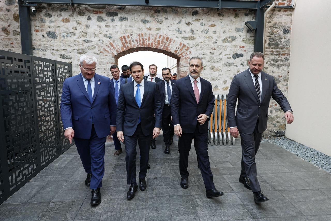 This handout photograph taken and released by Turkish Foreign Ministry on May 16, 2025, shows Turkey's Foreign Minister Hakan Fidan (2nd R), US Secretary of State Marco Rubio (2nd L), Ukraine's Foreign Minister Andriy Sybiga (L), walking at the backyard of the Turkish Presidential office Dolmabahce, in Istanbul, ahead their meeting for Ukraine-Russia peace talks, May 16, 2025. (AFP Photo)