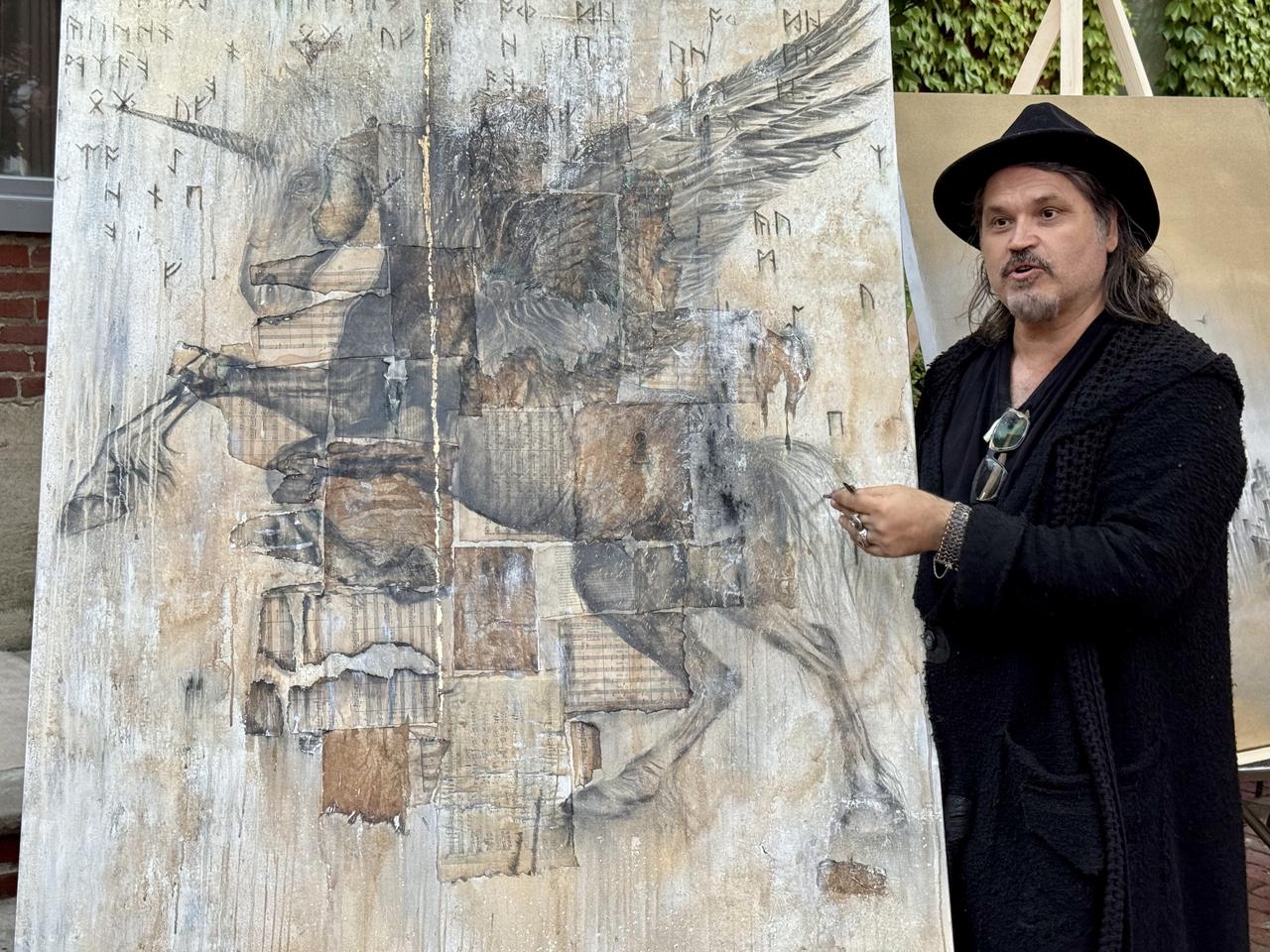 Renowned Turkish photographer Koray Kasap (seen in the photo) opened a 3D painting exhibition featuring objects from Turkish culture in the U.S. state of New Jersey, May 21, 2025. (AA Photo)