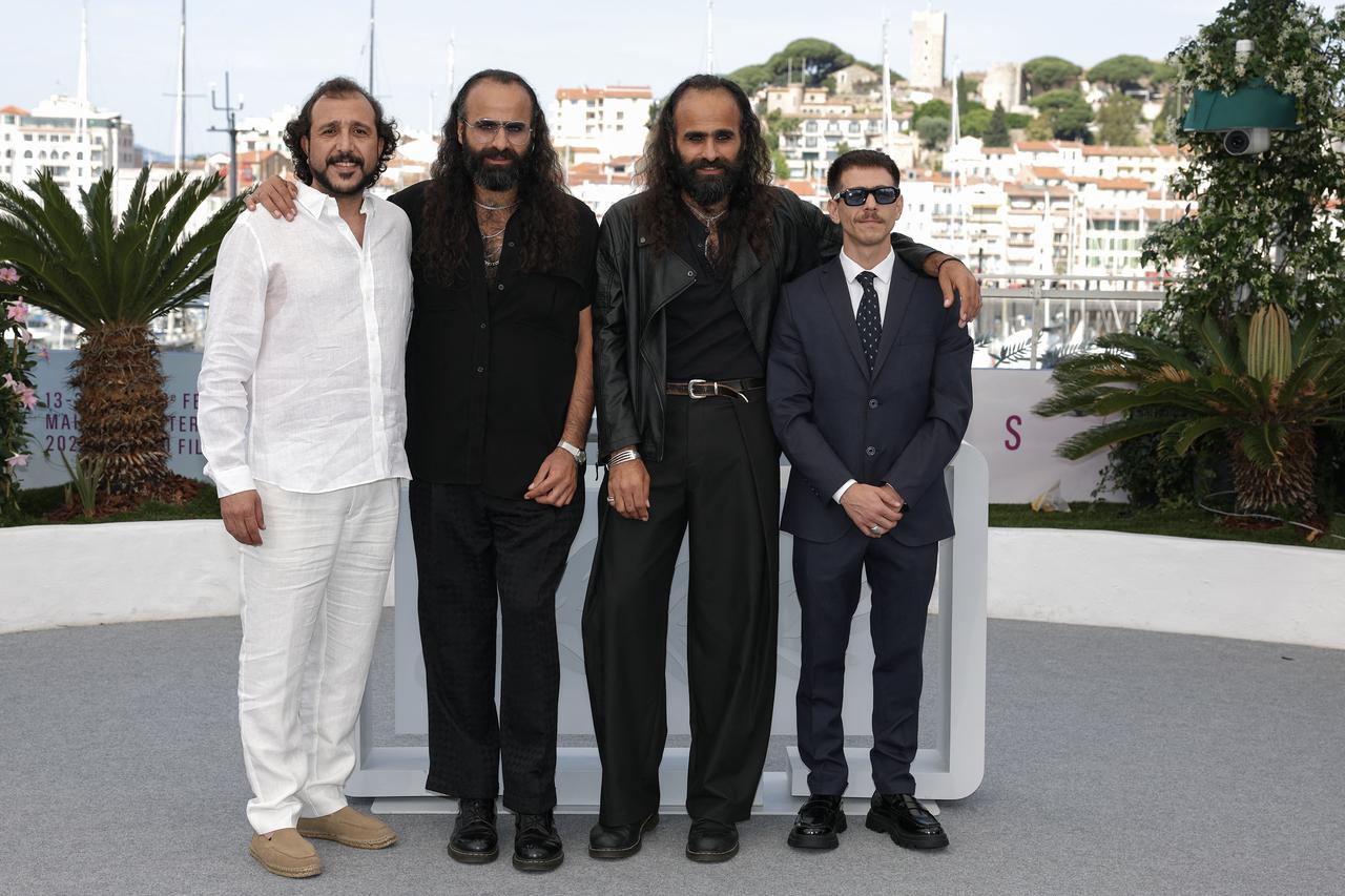 Palestinian-French producer Rani Massalha, Palestinian director and screenwriter Tarzan Nasser, Palestinian director and screenwriter Arab Nasser and Syrian actor Nader Abd Alhay pose during a photocall for the film Once Upon a Time in Gaza at the 78th edition of the Cannes Film Festival in Cannes, southern France, on May 19, 2025. (AFP Photo)