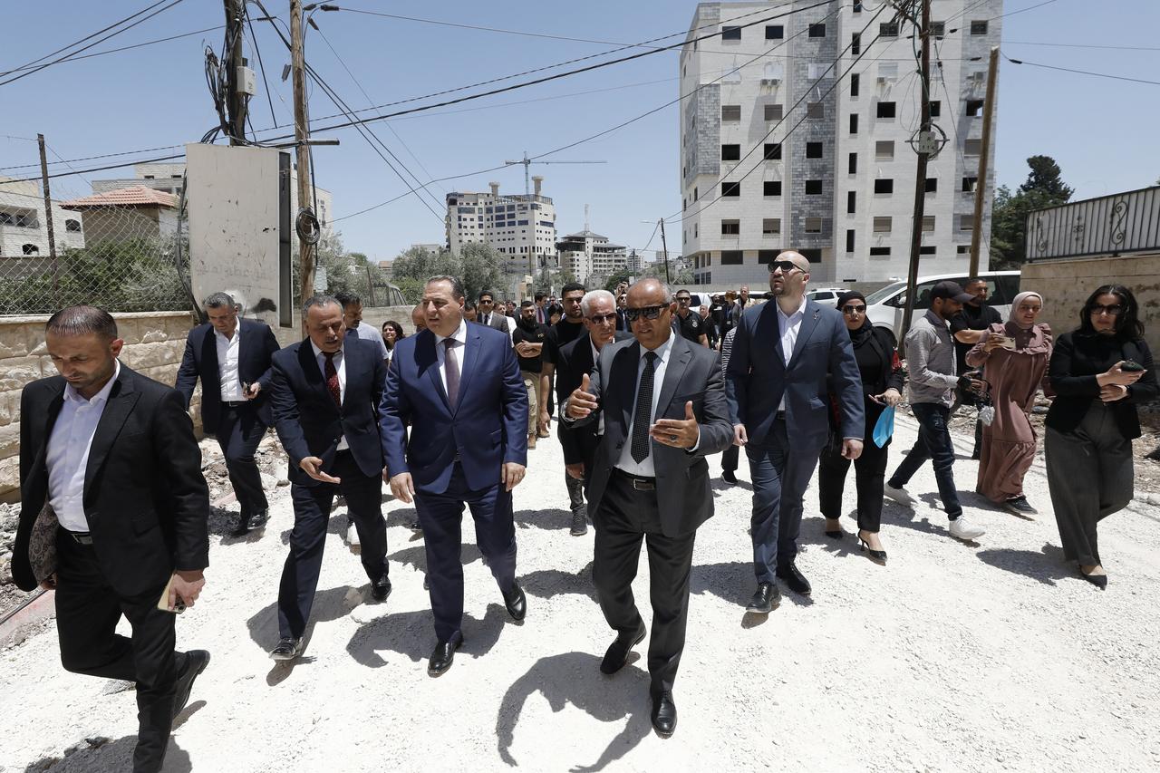 Members of a diplomatic delegation from the European Union walk near the eastern entrance of Jenin on May 21, 2025. (AFP Photo)