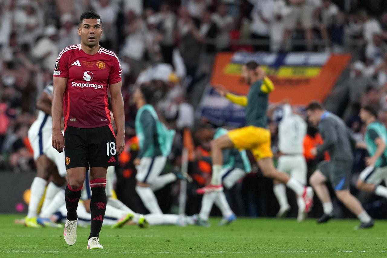 Manchester United's Brazilian midfielder #18 Casemiro reacts at the end of the UEFA Europa League final football match between Tottenham Hotspur and Manchester United at San Mames stadium in Bilbao on May 21, 2025. (AFP Photo)