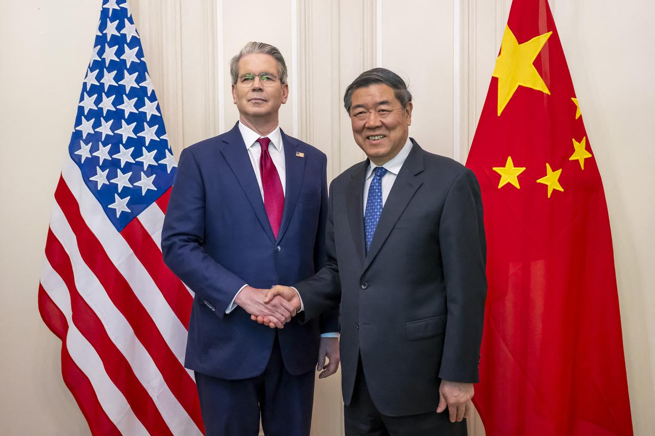 US Treasury Secretary Scott Bessent (L) shaking hands with China's Vice Premier He Lifeng during a meeting to discuss trade relations and tariffs, in Geneva, on May 10, 2025. (AFP Photo)