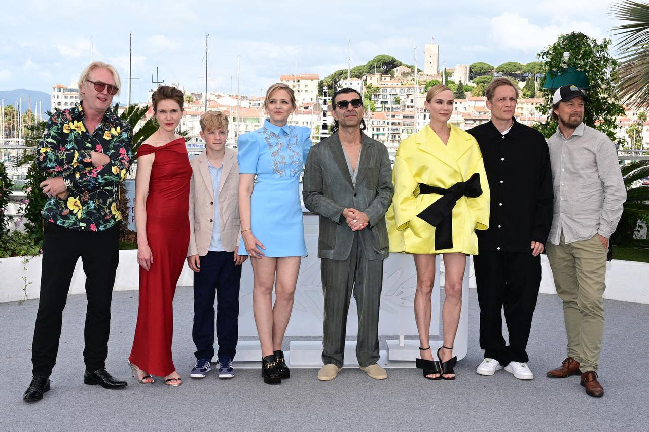 (From L) German actor Detlev Buck, German actress Lisa Hagmeister, German actor Jasper Billerbeck, German actress Laura Tonke, German director and screenwriter Fatih Akin, German actress Diane Kruger, German actor Matthias Schweighofer and German director Lars Jessen pose during a photocall for the film  Amrum  at the 78th edition of the Cannes Film Festival in Cannes, southern France, on May 16, 2025. (Photo by Miguel MEDINA / AFP)