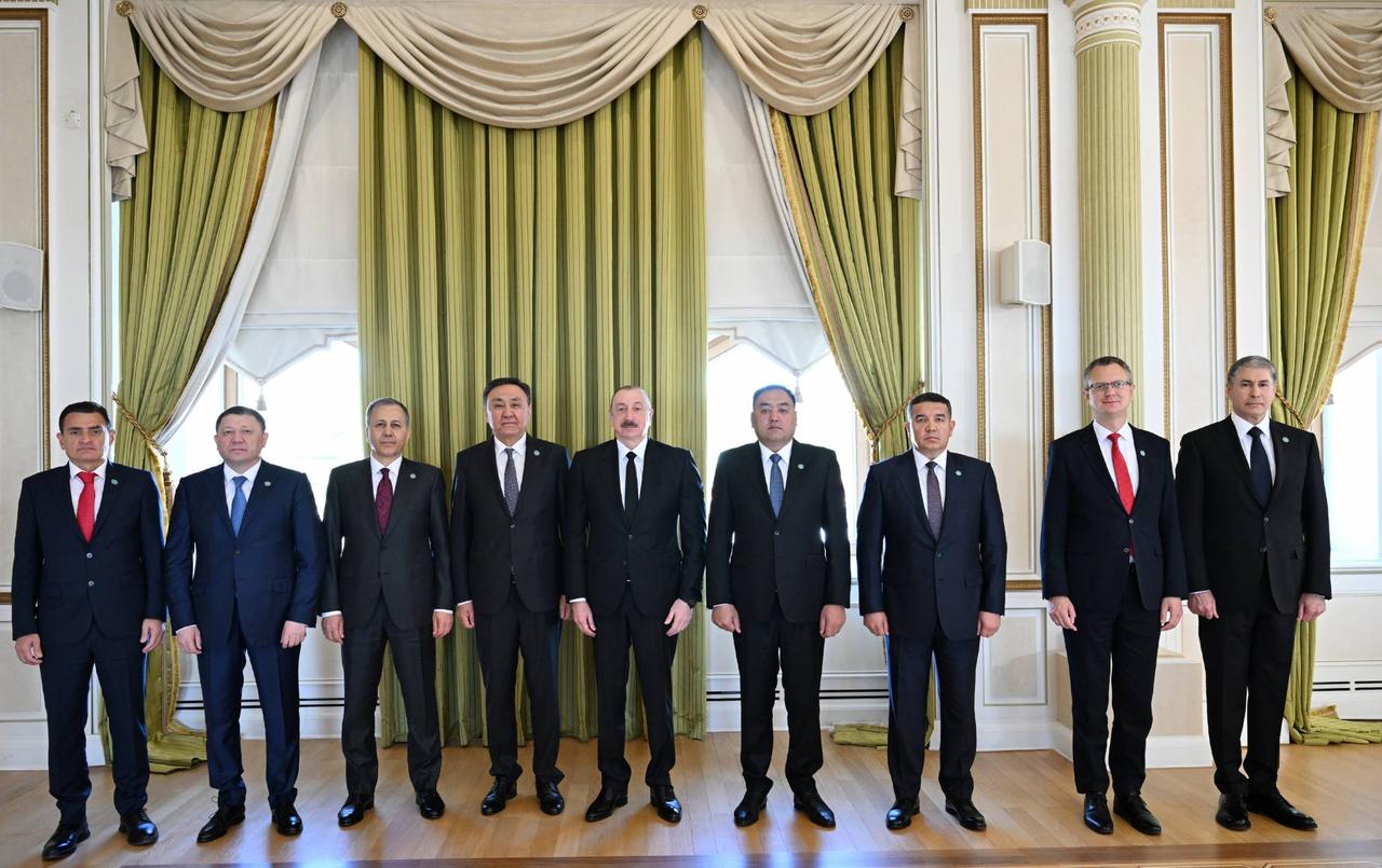 President of Azerbaijan Ilham Aliyev (C) receives the ministers who came to Baku as part of the 2nd Meeting of the Ministers of Interior of the Organization of Turkic States in Baku, Azerbaijan on May 23, 2025. (Azerbaijani Presidency /AA)