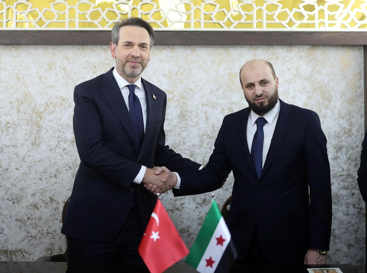 Turkish Minister of Energy and Natural Resources Alparslan Bayraktar meets his Syrian counterpart Mohammed al-Bashir in Damascus, Syria on May 22, 20255. (Tur. Min of Energy and Natural Res. - Anadolu Agency)
