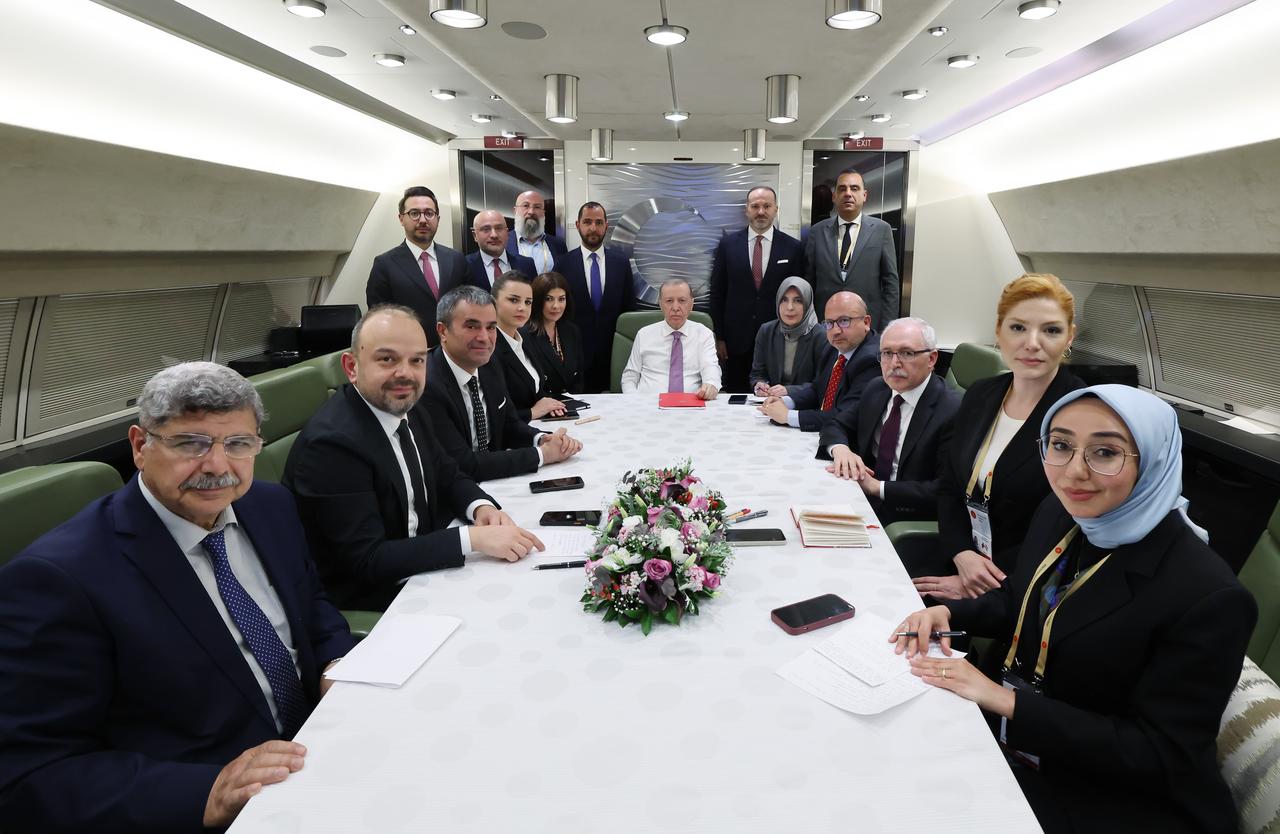 President Recep Tayyip Erdogan meets with members of the press aboard the presidential plane on his return from Hungary in Ankara, Türkiye, on May 23, 2025. (AA Photo)