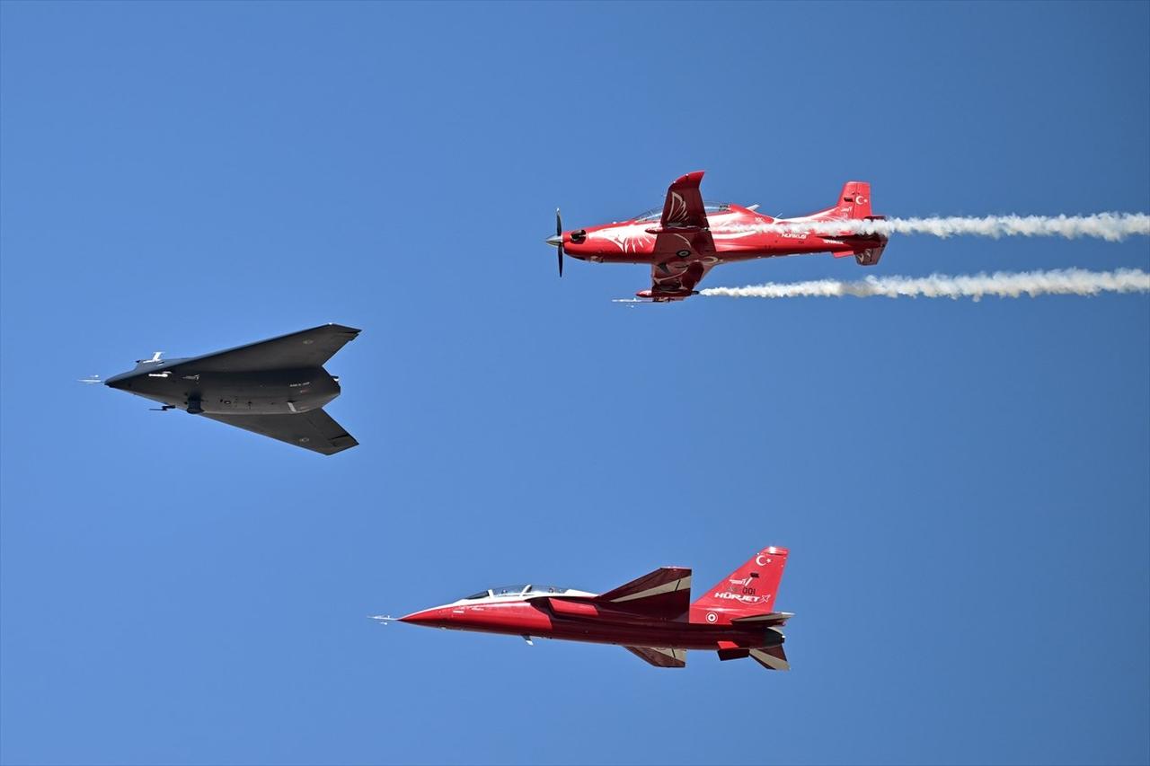 HURJET, ANKA III and HURKUS perform on the second day of Turkiyes premier technology and aerospace event TEKNOFEST, held at Adana Airport in Adana, Türkiye on October 3, 2024. (AA Photo)