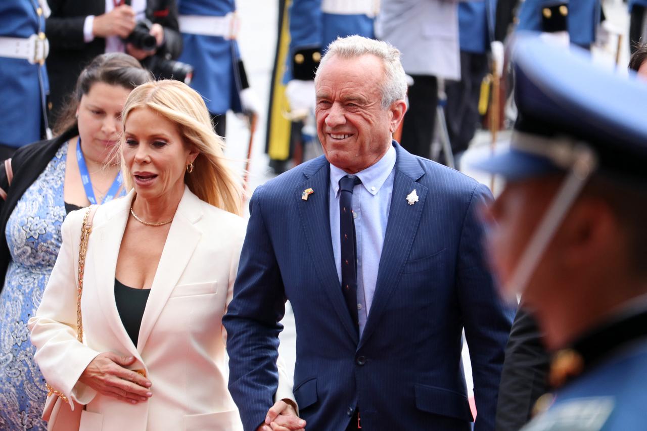 US Health and Human Services Secretary Robert F. Kennedy Jr. (R) and his wife, Cheryl Hines, arrive for the inauguration of Ecuador's re-elected President Daniel Noboa at the National Assembly in Quito on May 24, 2025. (AFP Photo)