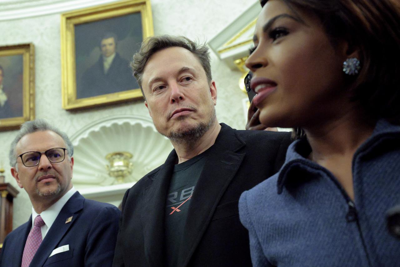 Tesla CEO Elon Musk (C) looks on during a meeting between President of South Africa Cyril Ramaphosa and U.S. President Donald Trump in the Oval Office of the White House on May 21, 2025 in Washington, DC. (AFP Photo)