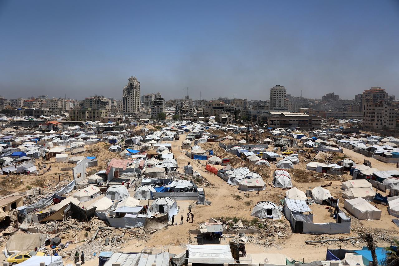 Tents are set up as temporary shelters for displaced Palestinians in Gaza City on May 25, 2025. Rescuers in Gaza said eight people were killed and dozens more wounded in Israeli air strikes across the Palestinian territory on May 25. (Photo by Omar AL-QATTAA / AFP)