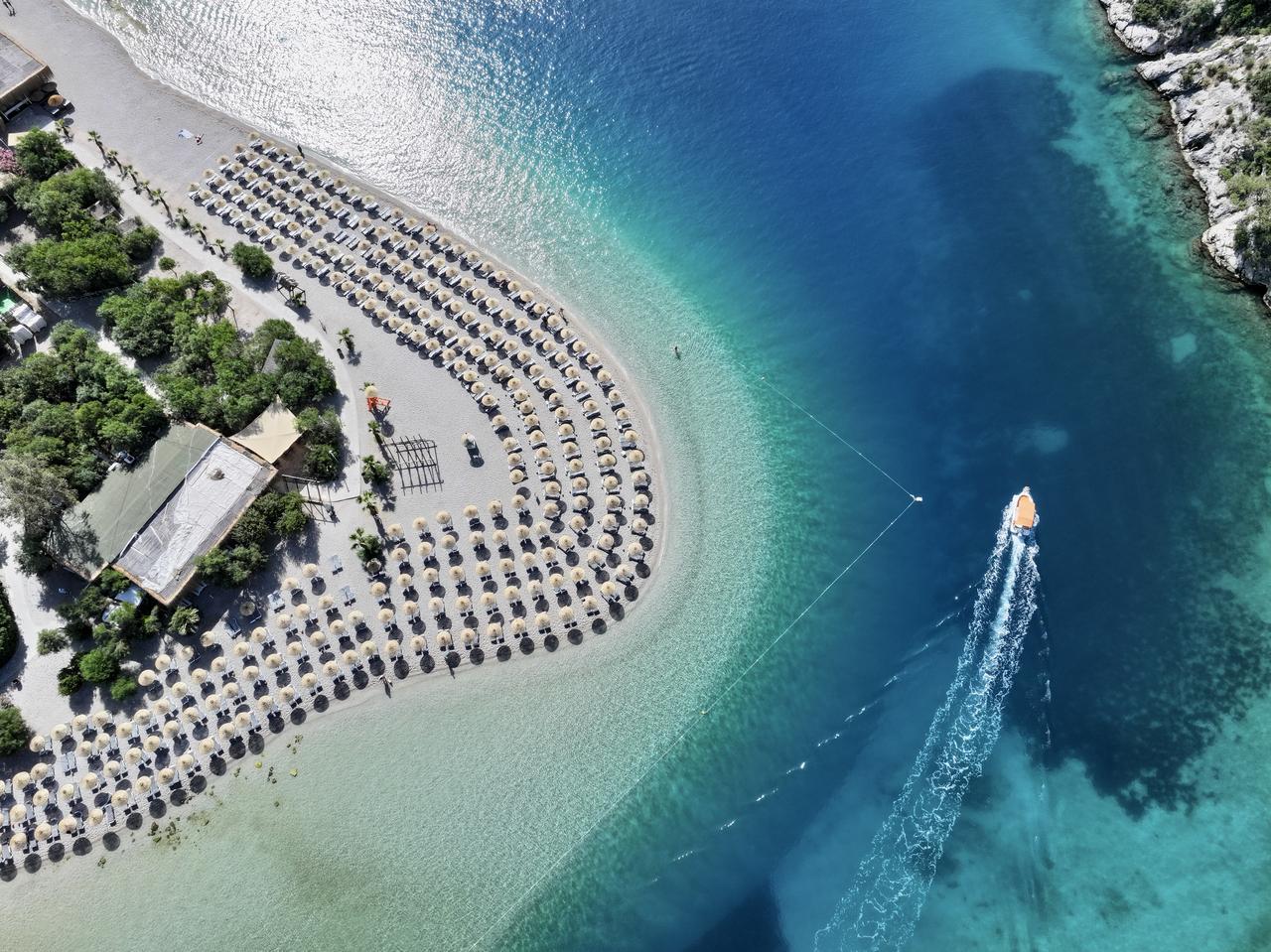 An aerial view of Kumburnu Beach, the first blue flag beach of the country, at Oludeniz, in Fethiye, Mugla, Türkiye, May 23, 2025. (AA Photo)