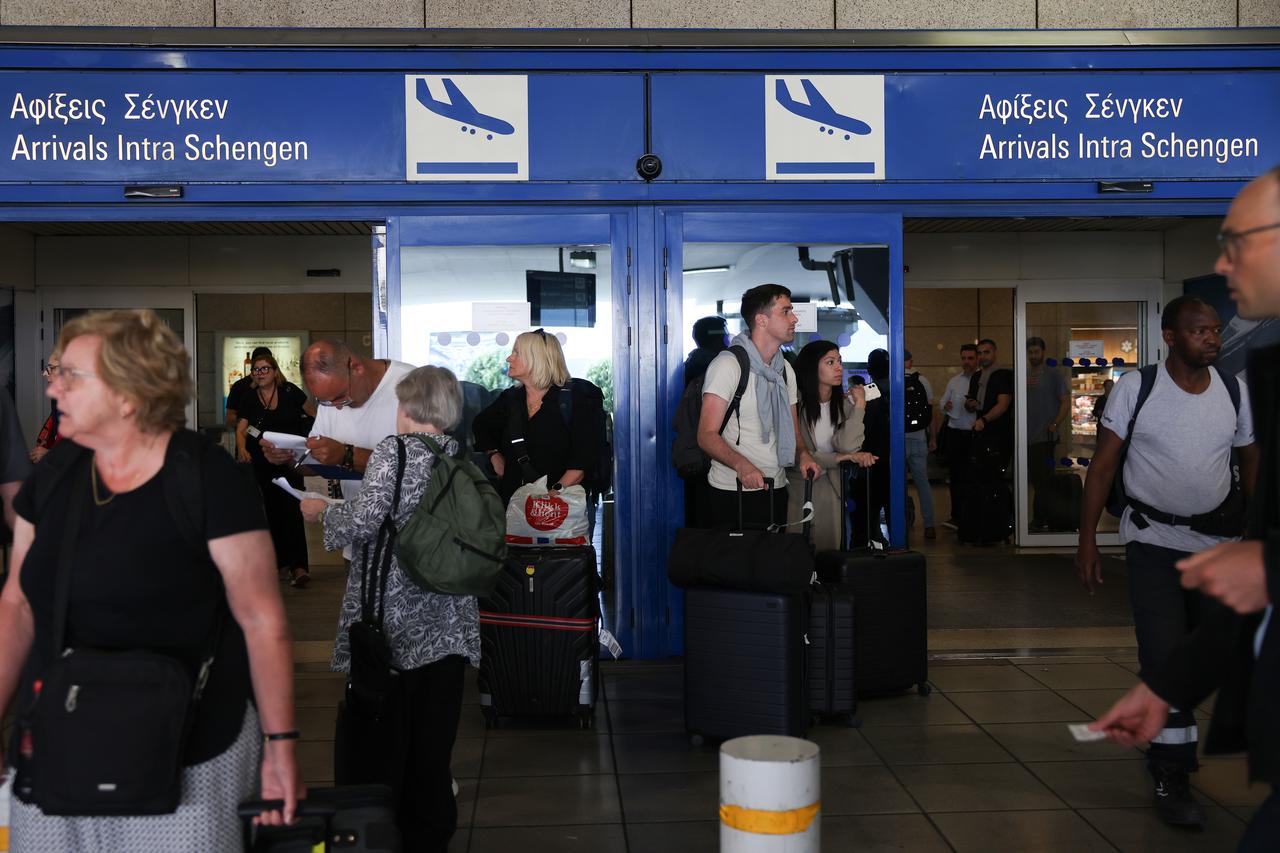 Tourists are seen outside Eleftherios Venizelos International Airport during a 48-hour taxi strike in Athens, Greece, May 28, 2025. (AA Photo)