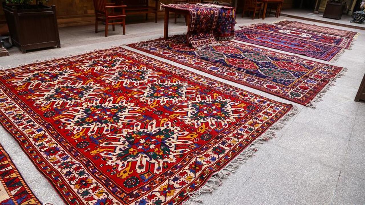 A vibrant patterned Azerbaijani carpet is showcasing intricate designs and rich colors. This traditional craft is globally recognized for its detailed designs and profound cultural significance. (AA Photo)