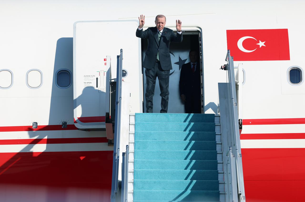 President Recep Tayyip Erdogan waves to those seeing him off at Esenboga Airport as he departs for Azerbaijan to meet with Azerbaijani President Ilham Aliyev and attend various official events, on May 28, 2025 in Ankara, Türkiye. (TUR Presidency / Murat Kula - Anadolu Agency)