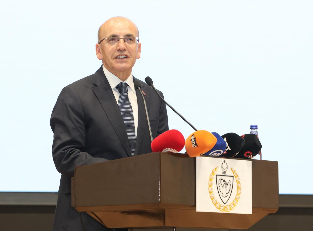 Minister of Treasury and Finance Mehmet Simsek delivers a speech at the conference themed “Developments in the Turkish and World Economy and Future Vision” organized in the Turkish Republic of Northern Cyprus (TRNC) on 27 May, 2025. (AA Photo)