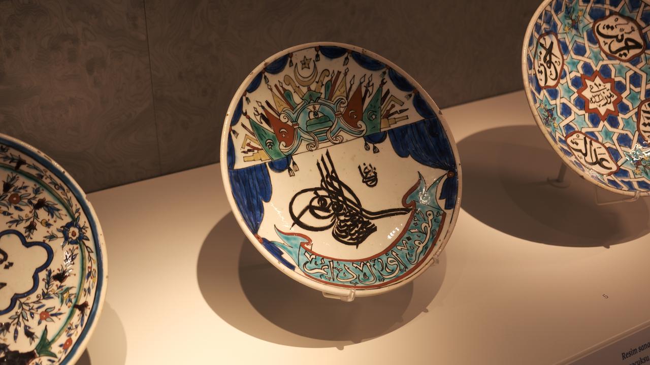 Artifacts from the “Inspiration and Innovation” section of the exhibition "Extraordinary Minas: The Story of Inspiration and Innovation in Kutahya Tiles and Ceramics," on view at the Pera Museum in Istanbul, Türkiye, May 27, 2025. (Photo via Koray Erdogan/Türkiye Today)