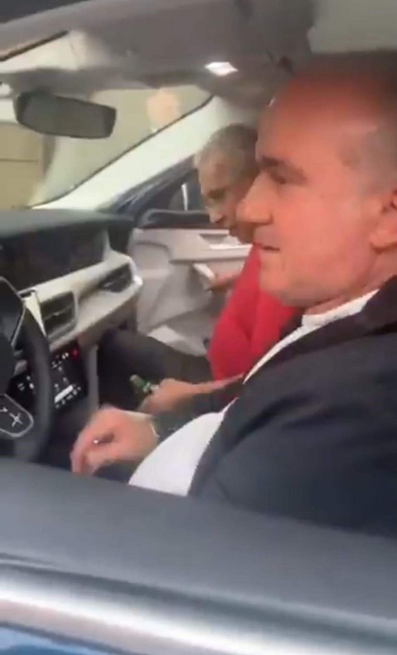 A photo allegedly showing Inan Kirac inside a vehicle during his reported abduction from Koc Hospital in Istanbul, captured on a mobile phone on May 22, 2025. (IHA Photo)