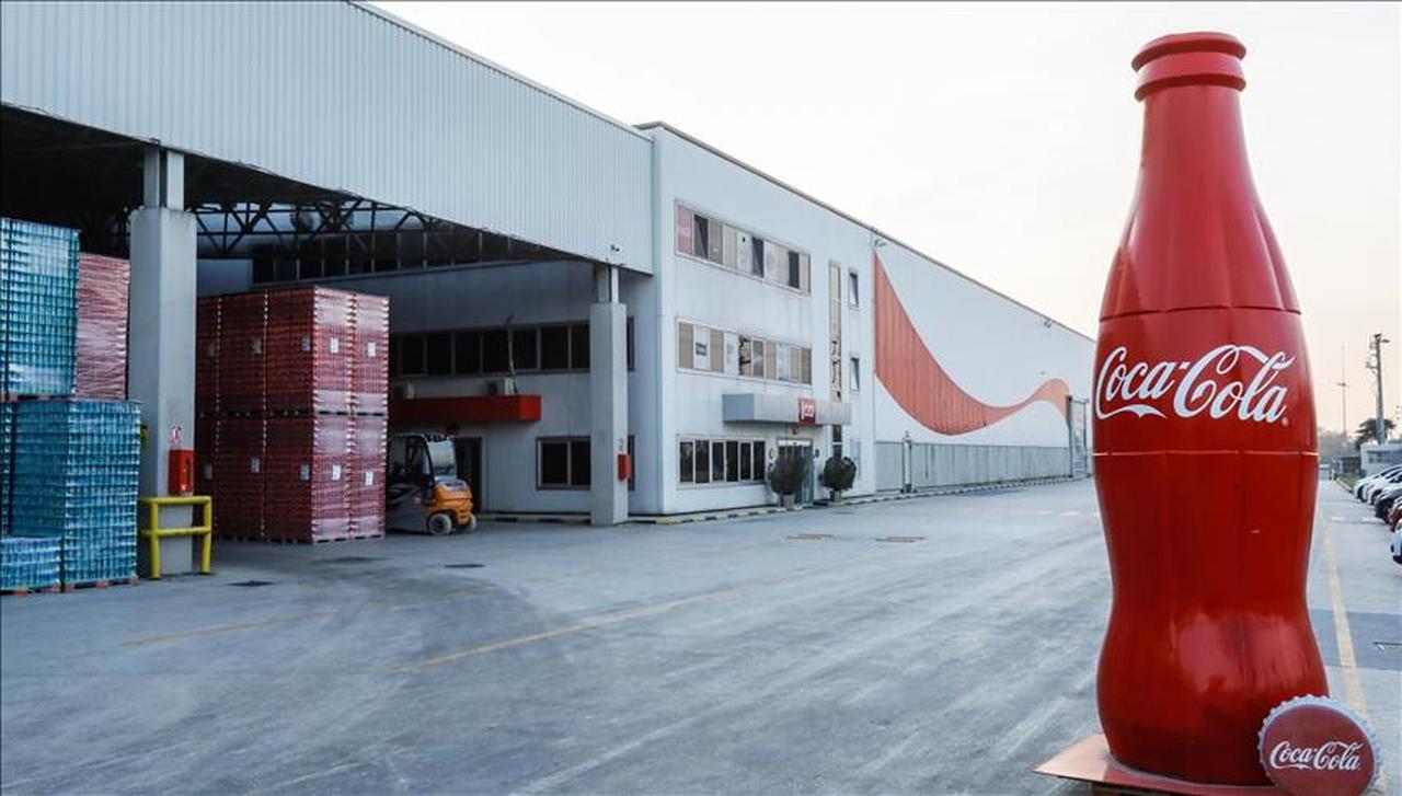 A large Coca-Cola bottle sculpture stands at the entrance of a Coca-Cola Icecek production facility in Türkiye, accessed on May 28, 2025. (AA Photo)