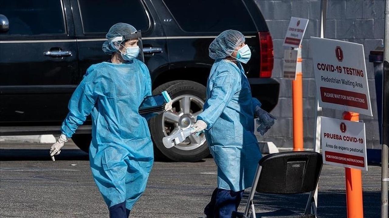 Medical personnel in protective gear at a COVID-19 testing facility in the USA (AA Photo)