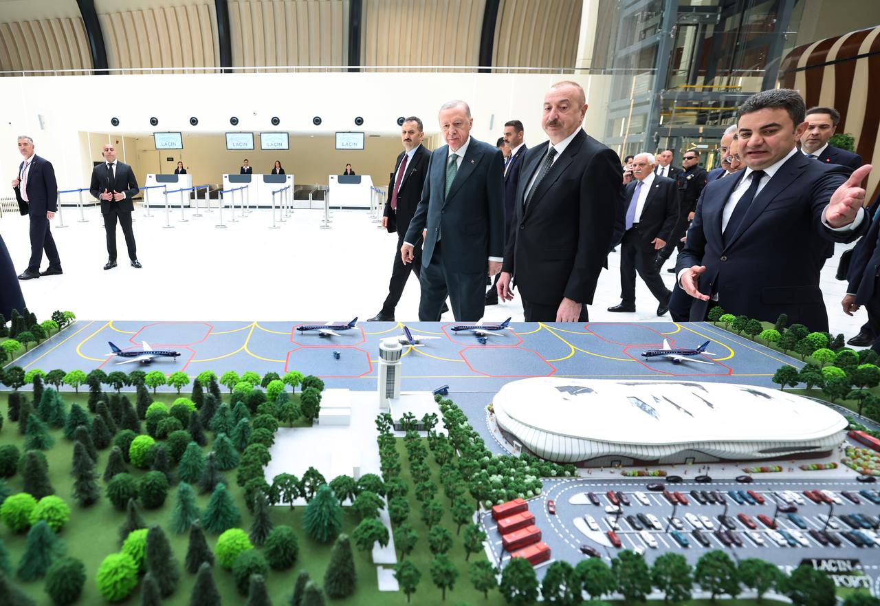 LACHIN, AZERBAIJAN - MAY 28: (----EDITORIAL USE ONLY – MANDATORY CREDIT -  TURKISH PRESIDENCY / MURAT CETINMUHURDAR / HANDOUT  - NO MARKETING NO ADVERTISING CAMPAIGNS - DISTRIBUTED AS A SERVICE TO CLIENTS----) Azerbaijani President Ilham Aliyev meets with the Turkish President Recep Tayyip Erdogan on May 28, 2025 at Lachin International Airport in the Azerbaijani city of Lachin, which was liberated from Armenia by the Azerbaijani army. ( TUR Presidency/Murat Cetinmuhurdar - Anadolu Agency )