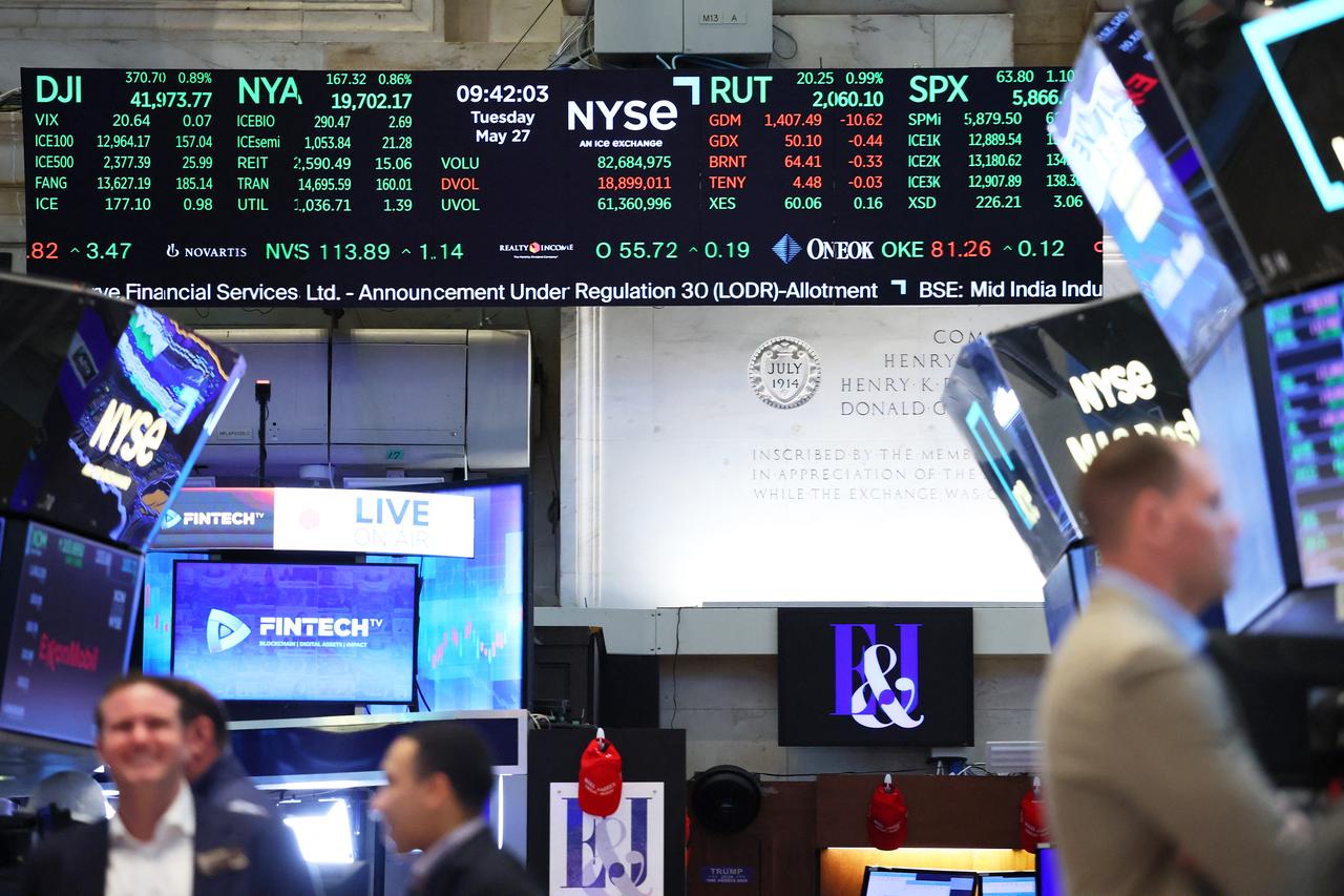 Stock market numbers are seen as traders work on the floor of the New York Stock Exchange during morning trading on May 27, 2025 in New York City. (AFP Photo)