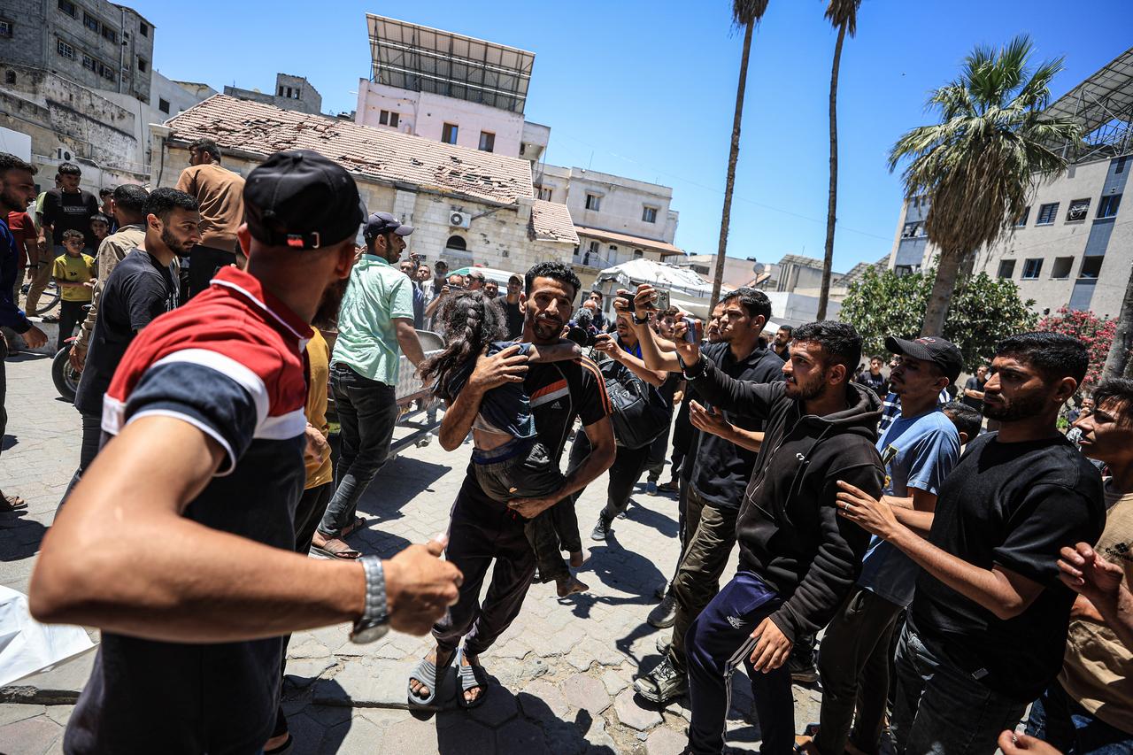 Wounded Palestinians, including children and babies, are brought to the al-Ahli Baptist Hospital after attack by the Israeli military on the Zaytoun Quarter of Gaza Strip on May 29, 2025. (AA Photo)