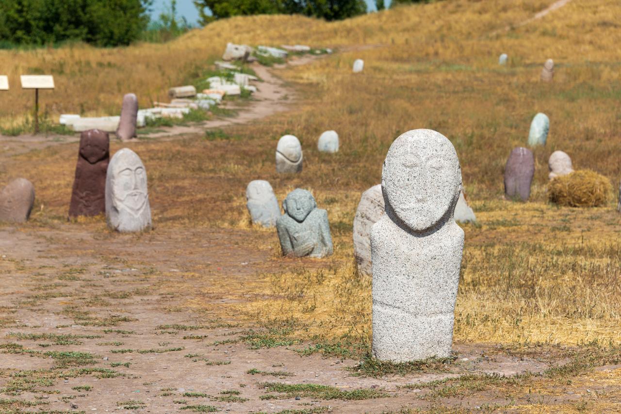 Ancient balbals at ruins of Balasagun in Tokmok, Kyrgyzstan, Aug 8, 2018. (Adobe Stock Photo)