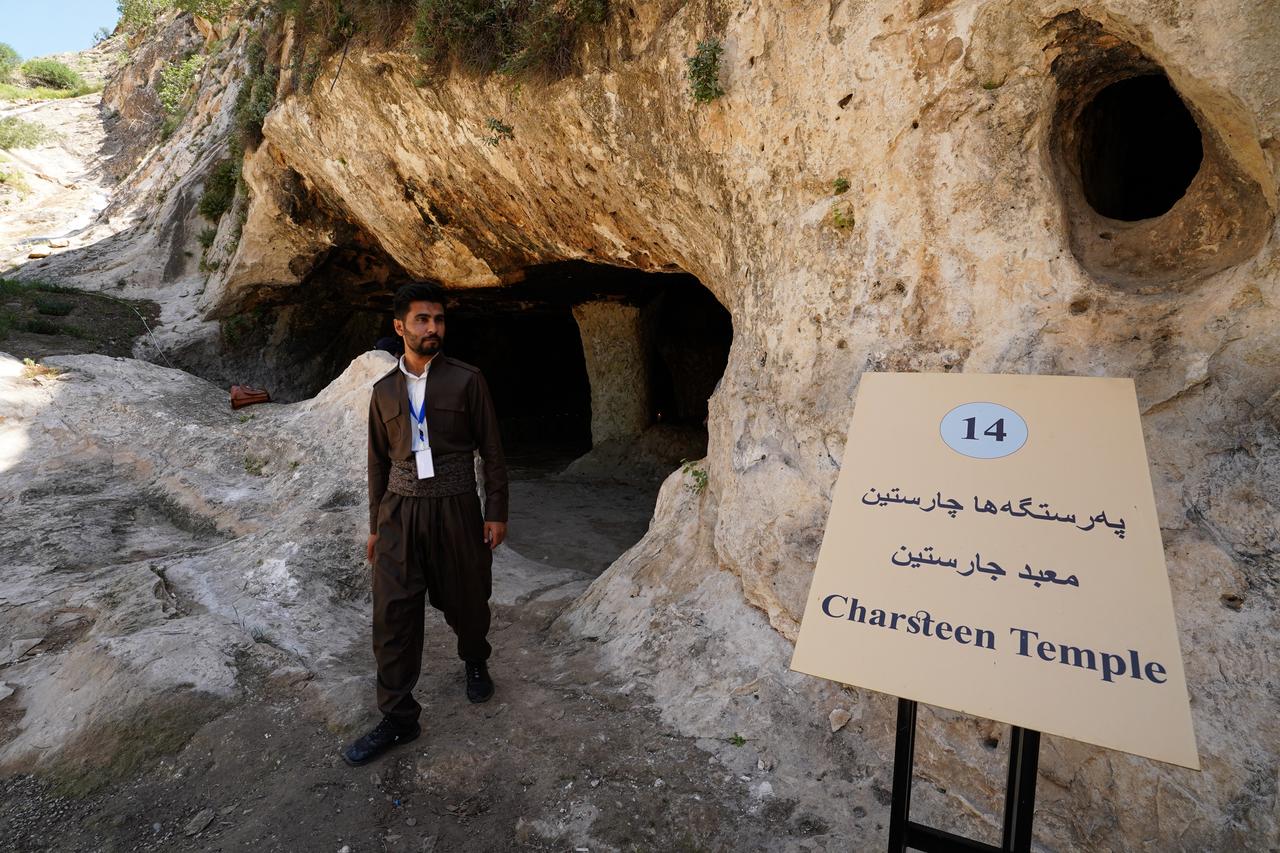 People visit Charsteen archaeological site including a temple of Zoroastrianism after it was reopened to visitors following restoration works in Duhok, Iraq, April 27, 2025. (AA Photo)
