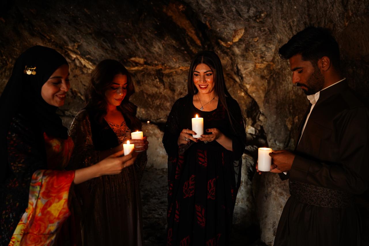 People visit Charsteen archaeological site including a temple of Zoroastrianism after it was reopened to visitors following restoration works in Duhok, Iraq, April 27, 2025. (AA Photo)