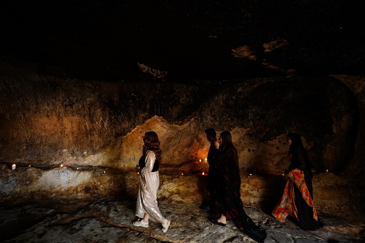 People visit Charsteen archaeological site including a temple of Zoroastrianism after it was reopened to visitors following restoration works in Duhok, Iraq, April 27, 2025. (AA Photo)