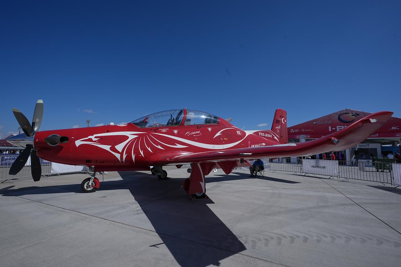 LEFKOSIA, TRNC - MAY 01: TAI Hurkus is exhibited during Turkiye's premier technology and aerospace event TEKNOFEST on the first day at Ercan Airport in Lefkosia, Turkish Republic of Northern Cyprus (TRNC) on May 01, 2025. The four-day event will take place at the old Ercan Airport in Lefkosia, under the auspices of the TRNC Presidency, and will feature a packed schedule of competitions, air shows, exhibitions, and workshops. The event has been organized by the Turkish Technology Team (T3) Foundation and the Turkish Industry and Technology Ministry jointly since 2018, in cooperation with dozens of ministries, public institutions, private firms, and universities. ( Ahmet Serdar Eser - Anadolu Agency )