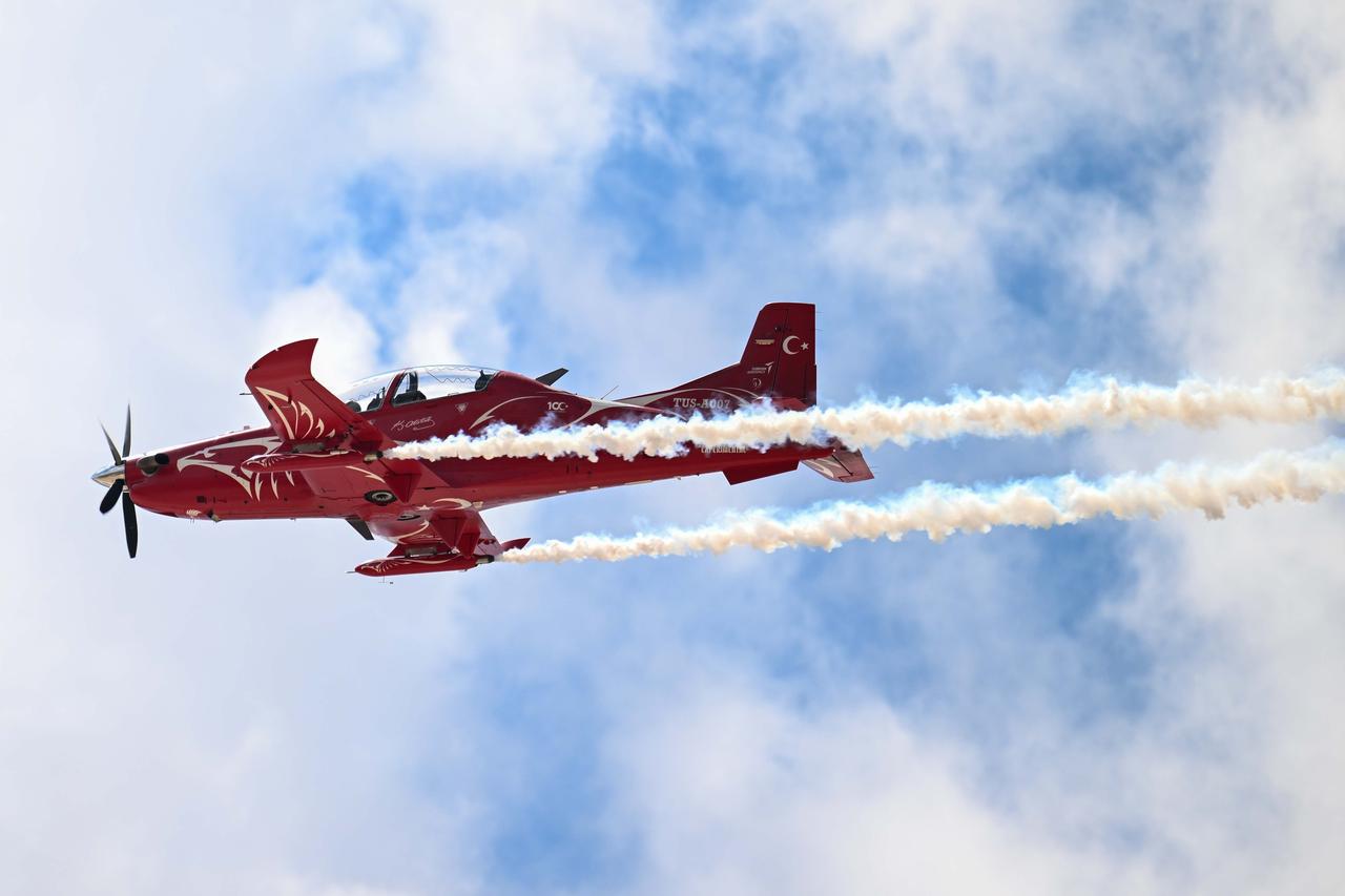 LEFKOSIA, TRNC - MAY 01: TAI Hurkus is exhibited during Turkiye's premier technology and aerospace event TEKNOFEST on the first day at Ercan Airport in Lefkosia, Turkish Republic of Northern Cyprus (TRNC) on May 01, 2025. The four-day event will take place at the old Ercan Airport in Lefkosia, under the auspices of the TRNC Presidency, and will feature a packed schedule of competitions, air shows, exhibitions, and workshops. The event has been organized by the Turkish Technology Team (T3) Foundation and the Turkish Industry and Technology Ministry jointly since 2018, in cooperation with dozens of ministries, public institutions, private firms, and universities. ( Ahmet Serdar Eser - Anadolu Agency )