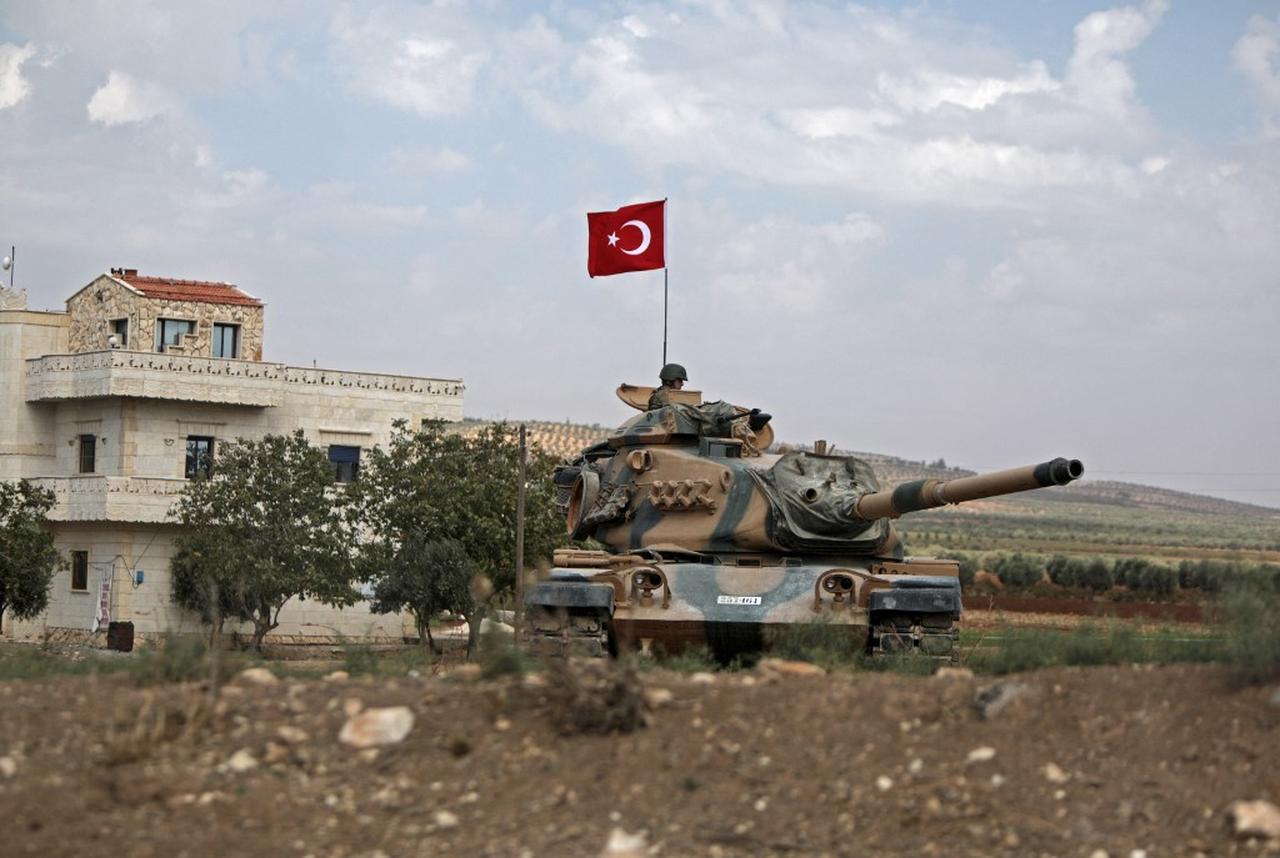 Turkish troops are pictured in the area of Kafr Jannah on the outskirts of the Syrian town of Afrin on October 18, 2022. (AFP Photo)