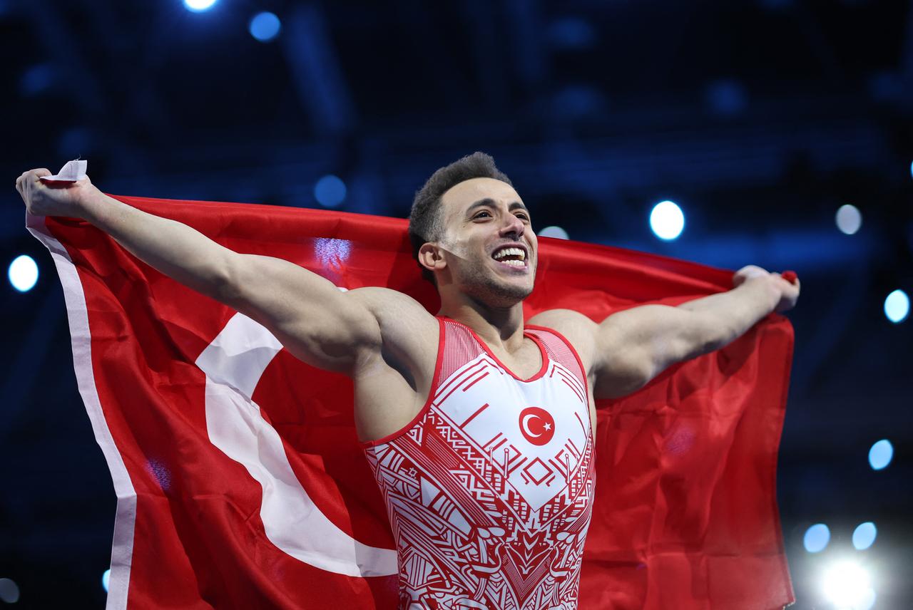 Adem Asil celebrates winning the Mens all around of the Mens and Womens Artistic Gymnastics European Championships in Leipzig, eastern Germany on May 29, 2025. (AFP Photo)