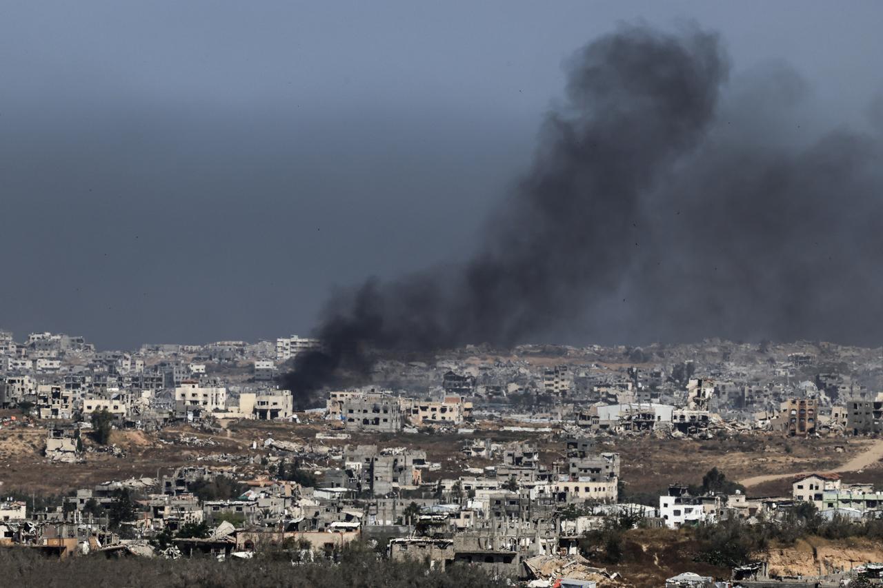 Smoke and dust rising over the destroyed and heavily damaged residential areas following the Israeli attacks in the northern Gaza Strip are seen from the Gaza-Israel border region on May 31, 2025. (AA Photo)