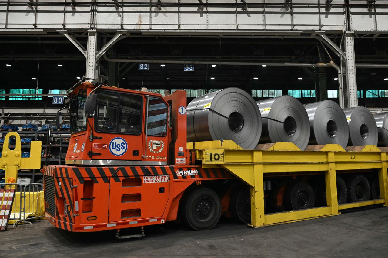 A US Steel logo is seen on a vehicle loaded with rolls of steel during a visit by the US president to US Steel - Irvin Works in West Mifflin, Pennsylvania, May 30, 2025. (AFP Photo)