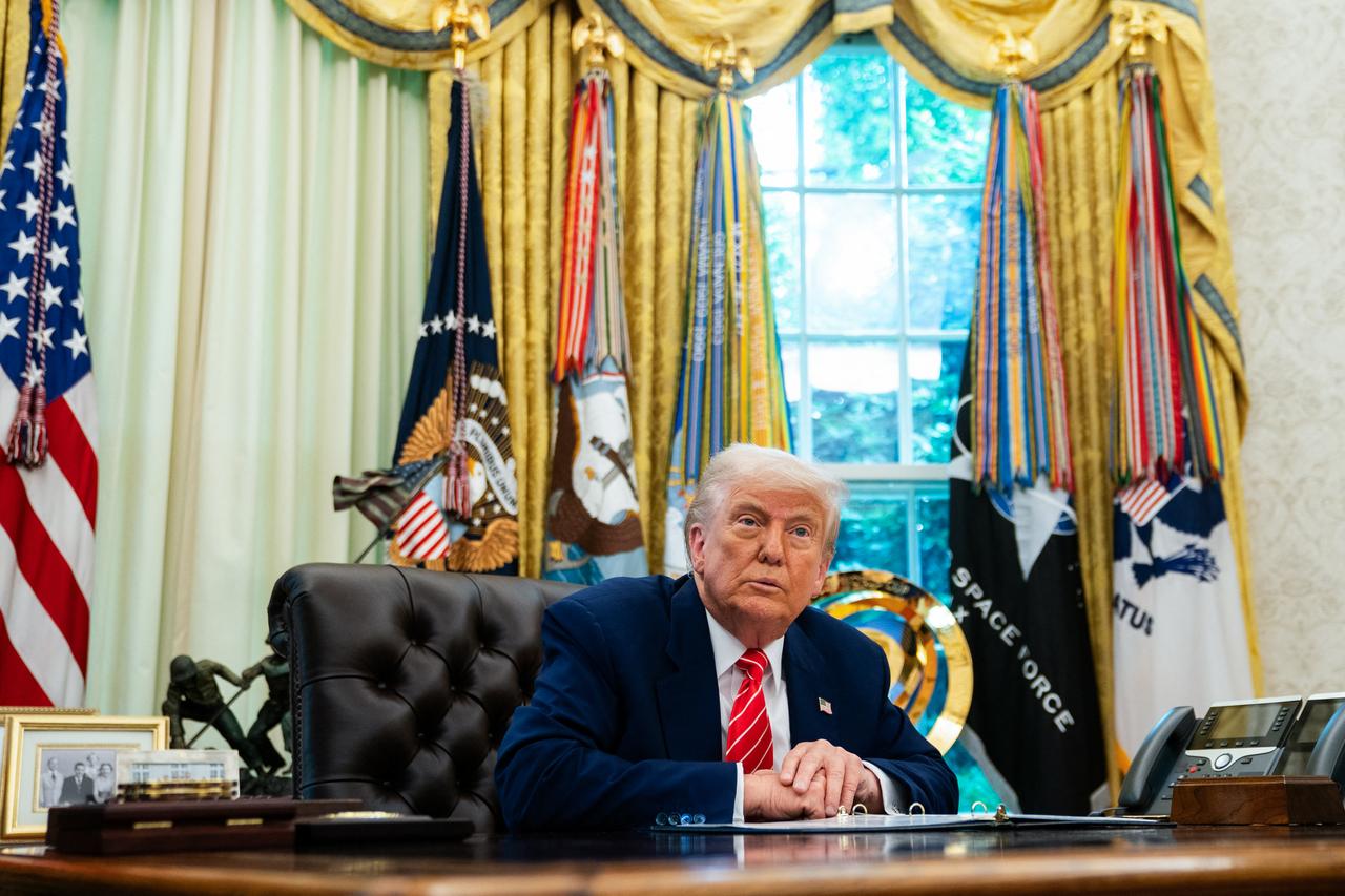 US President Donald Trump speaks during a news conference with Elon Musk in the Oval Office of the White House in Washington, DC, on May 30, 2025. Musk, who stormed into US politics as President Trumps chainsaw-brandishing sidekick, announced on May 28 that he is leaving his role in US government, intended to reduce federal spending, shortly after his first major break with the President over Trumps signature spending bill. (Photo by Allison ROBBERT / AFP)