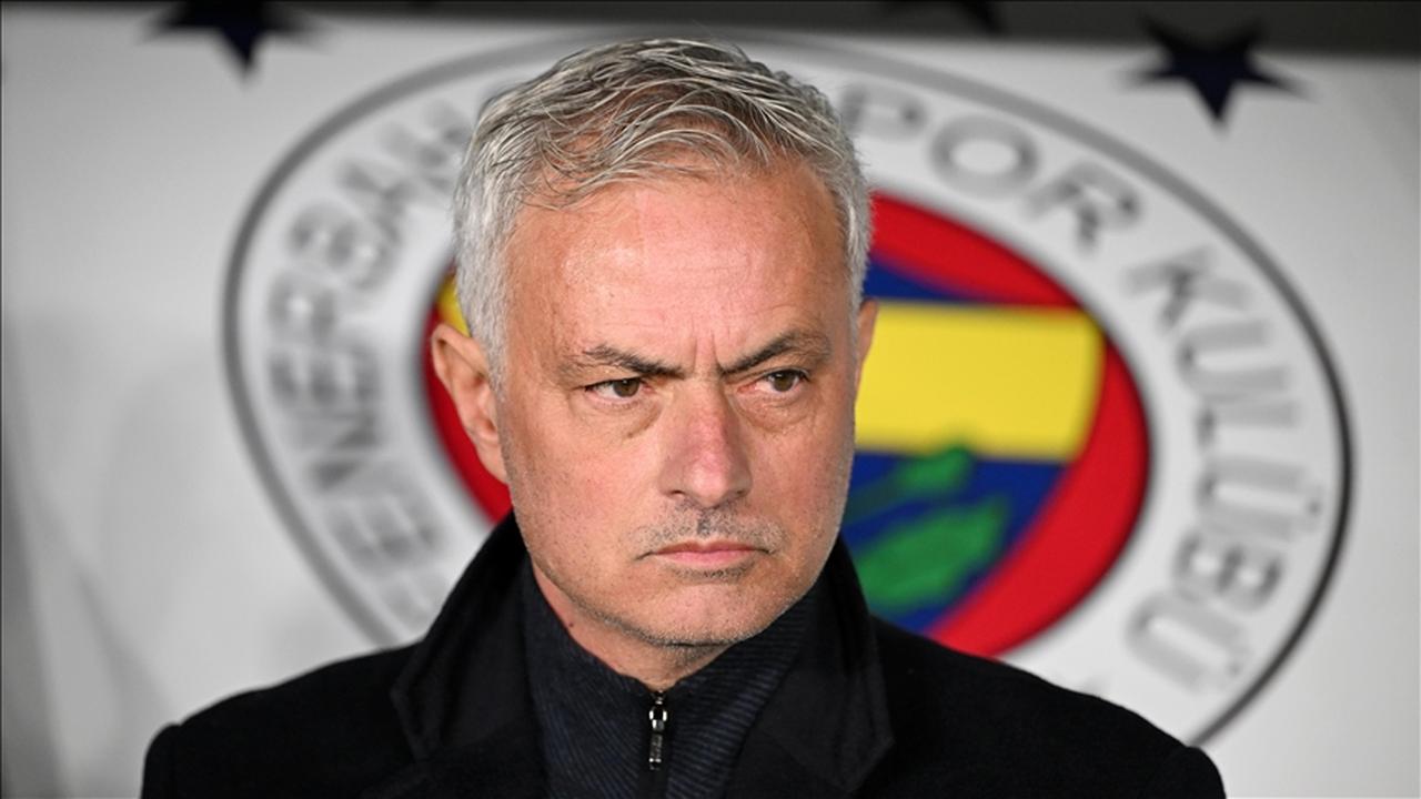 Fenerbahce head coach Jose Mourinho appears visibly tense as title pressure mounts ahead of the season’s final weeks, pictured in front of the club emblem in Istanbul, Türkiye, accessed on May 3, 2025. (AA Photo)