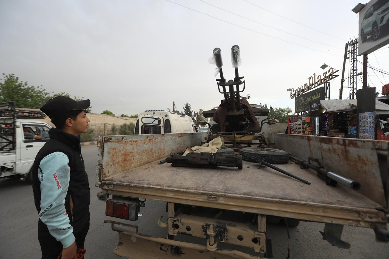 Druze groups hand over heavy weapons to the Interior Ministry in Damascus on 4 May 2025. (AA Photo)